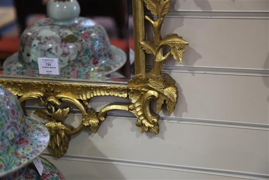 A Chinese Chippendale style carved giltwood wall mirror, 3ft 6in. x 2ft 1in.